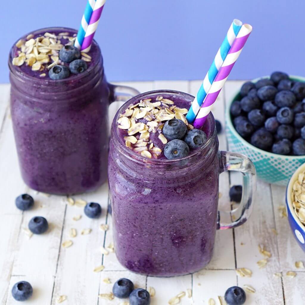 Two smoothies with blueberry