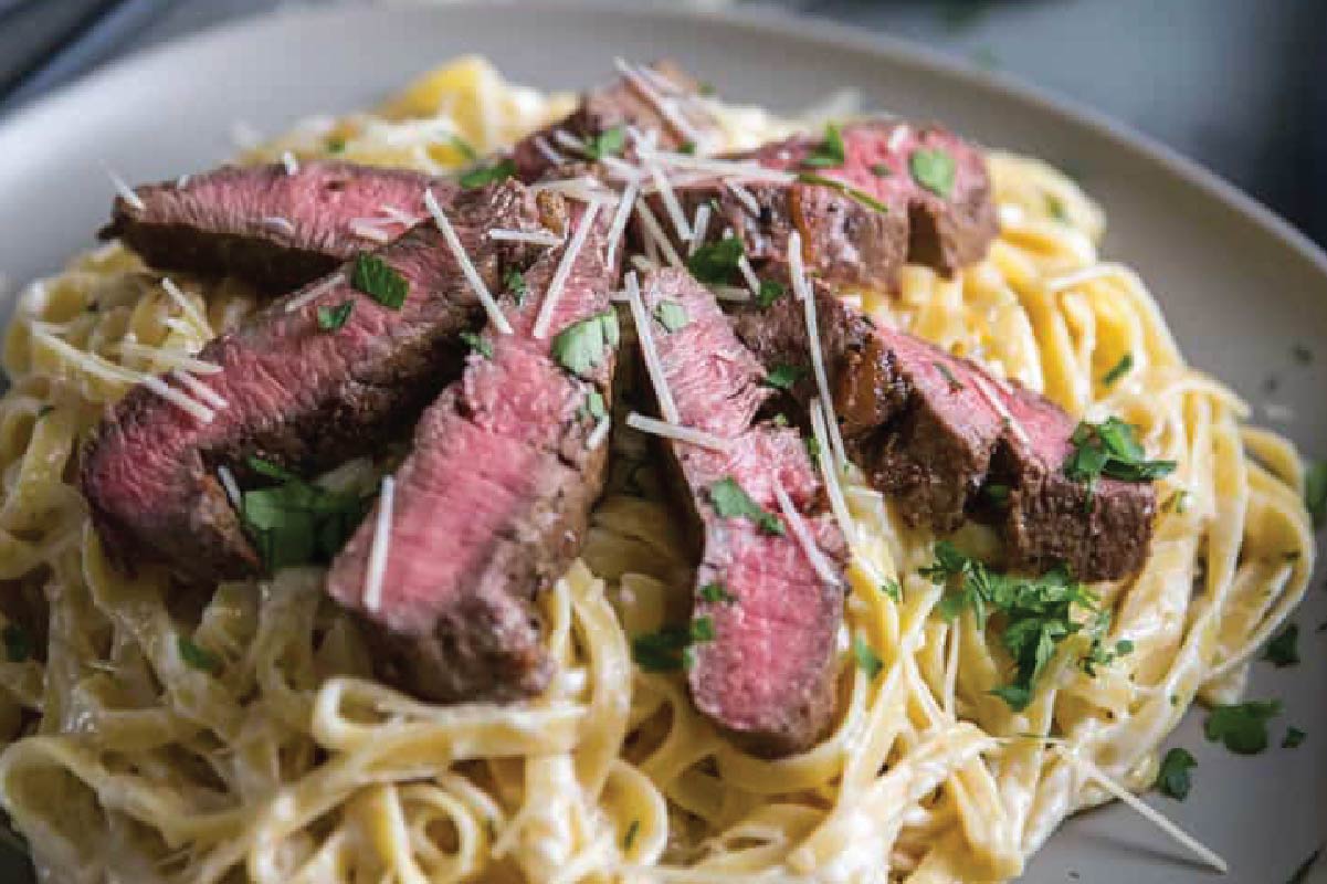 photo with creamy pasta with steak